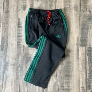 Adidas Black Joggers with Green Stripes